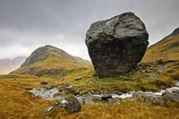 Definition & pronunciation of boulder