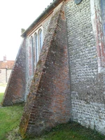 Definition & pronunciation of buttress