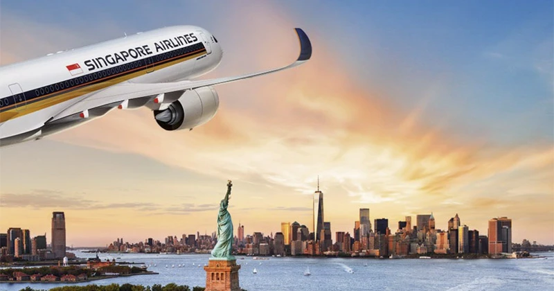 I am flying to New York tomorrow.