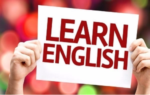 Why do university students have to be fluent in English?